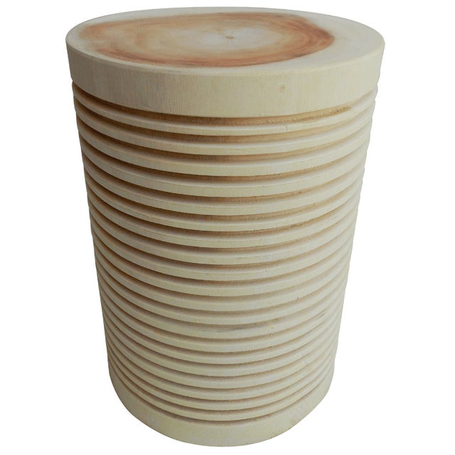 The Ade Suar Stool by Artesia is a beautiful piece of furniture that adds a touch of nature to any space. Handcrafted from...