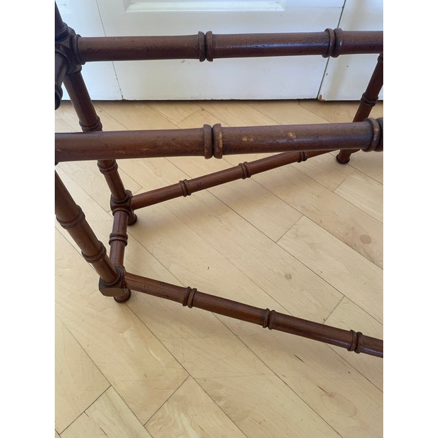 Listed is a wonderful faux bamboo coffee table base that would make a warm and timeless addition to any space.