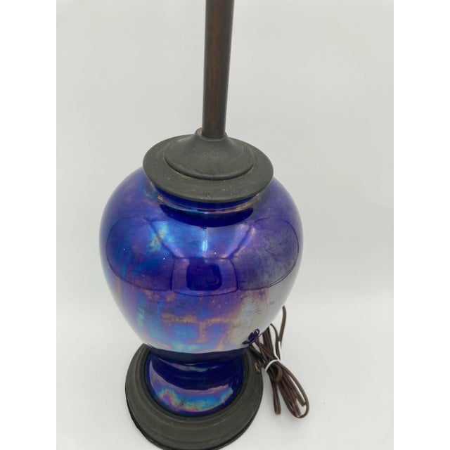This cool mid century bright blue opalescent/iridescent table lamp is sure to make a unique addition to your living space....