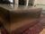 A minimalist sculptural ottoman handcrafted from brushed stainless steel. Featuring a clean monolithic silhouette and...