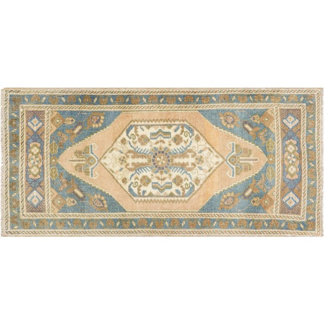 Expertly crafted from traditional Turkish patterns, this Vintage Oushak Yastic rug is a timeless addition to any room....