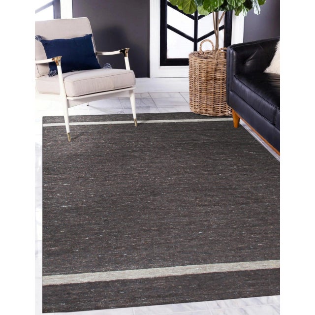 Violet Artistic Brown Flatweave Wool Rug, Country of Origin: India. This exceptional piece exemplifies minimalist design...