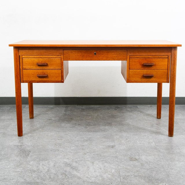 Danish modern executive desk. Comes with 5 drawers, 1 of which is locking as in the center. Due to the piece being fully...