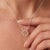 Delicately crafted in 925 Sterling Silver, this graceful pendant necklace features a charming open circle design adorned...