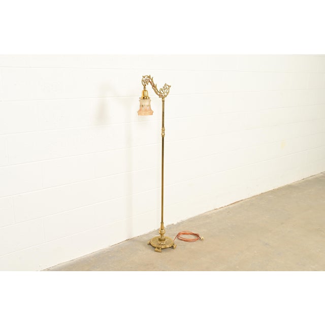 An outstanding Art Nouveau or Art Deco period brass bridge floor lamp USA, Early 20th Century Measures: 9.5"W x 14.75"D x...