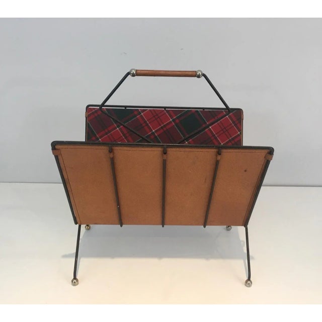 This rare magazine rack is made of fabric and leather on a black lacquered metal base, plaid fabric. This is a very nice...