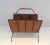 This rare magazine rack is made of fabric and leather on a black lacquered metal base, plaid fabric. This is a very nice...