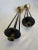A Pair of MId Century Modern Black Metal and Brass Candlesticks For Sale - Image 10 of 10