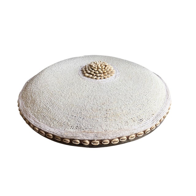 Superb Vintage African tribal round shield, meticulously hand made. This authentic Bamileke piece features a striking...