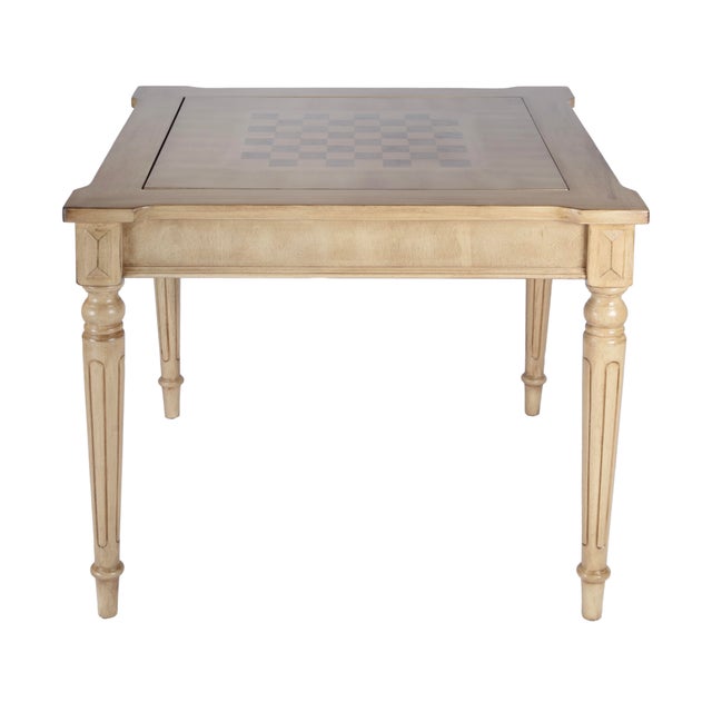 Play a variety of games on this stylish table that is veneered with solid basswood. The top inset has a game board for...