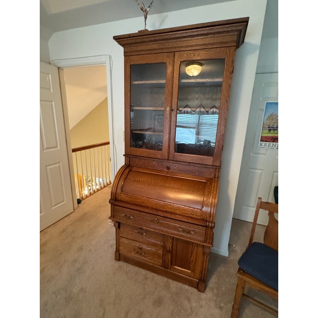 Gorgeous Tiger oak rolltop secretary. Great condition. 82” t x 36” w x 22” deep Glass front bookshelves for display....