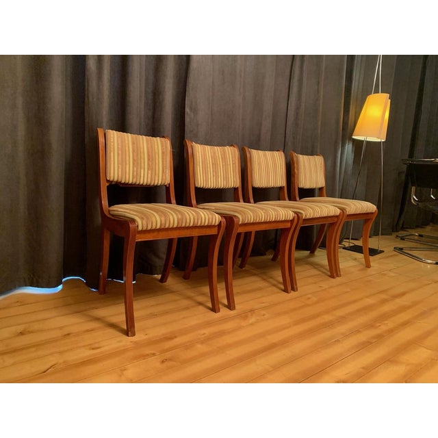A set of four Thomas Glenister chairs from the 1960s. In original and very good condition. High quality workmanship from...
