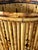 A charming pair of vintage bamboo cache pots that effortlessly bring warmth and texture to any space. Handcrafted with...