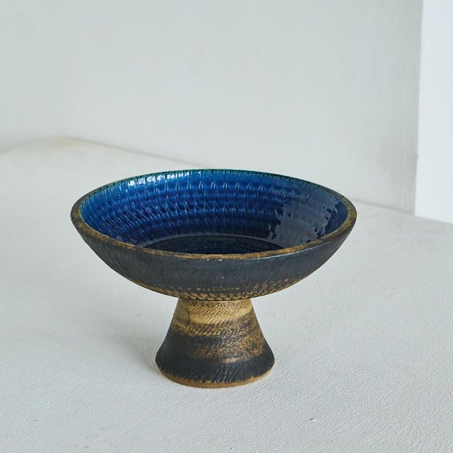 Studio pottery pedestal bowl or centerpiece, europe, mid 20th century. A striking mid-century studio pottery bowl raised...