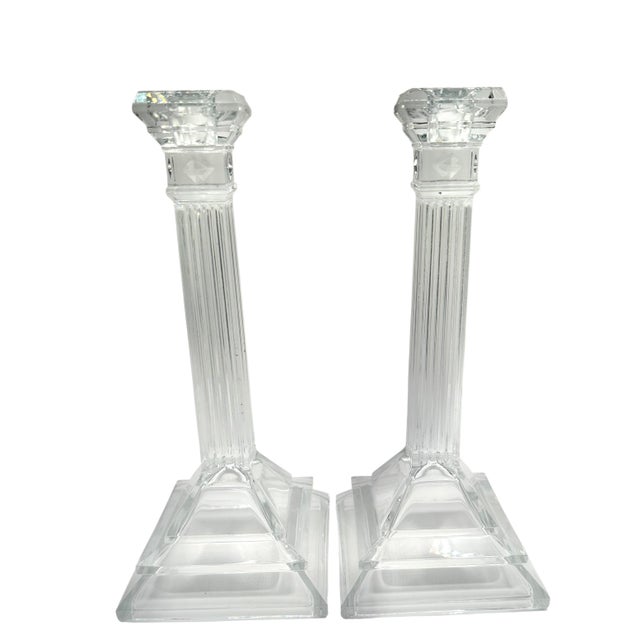 Enhance the ambiance of your home with these vintage candlestick holders that feature a clear glass column. The square...