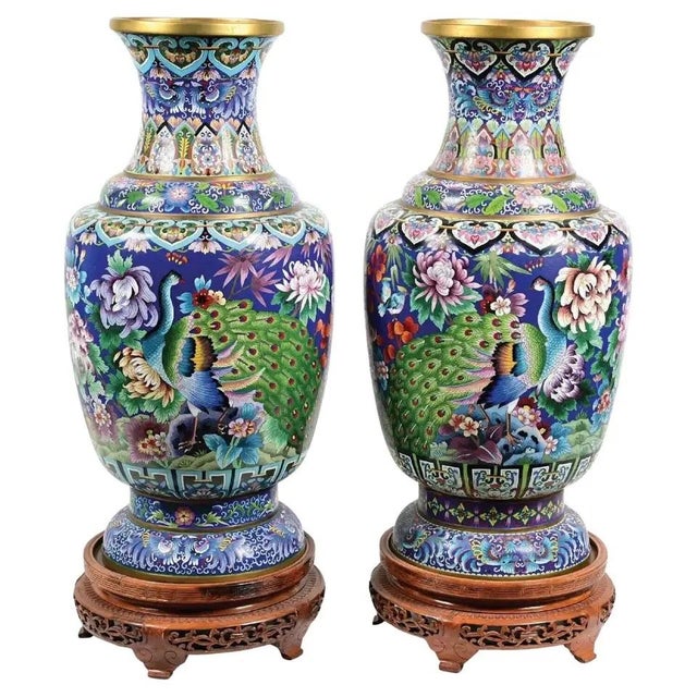 Pair Of Palatial Monumental Blue Chinese Cloisonne Enamel Vases With Peacocks Multicolored floral designs with an array of...