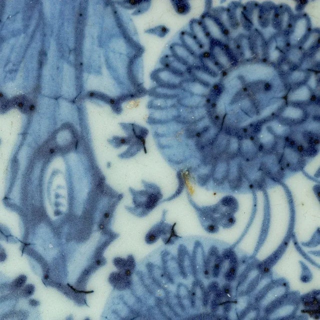 Chinese Blue and White Porcelain Shallow Bowl, with floral and vine motif. 1.5" H x 7.75" Diameter. Provenance: From an...