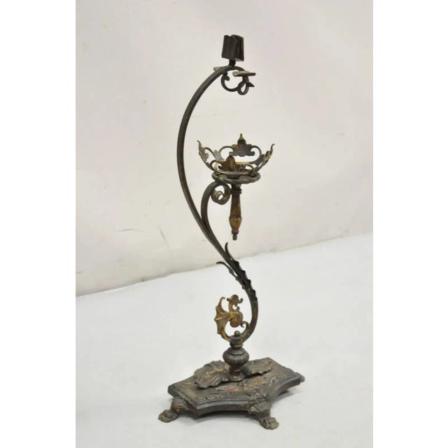 Antique French Art Nouveau Figural Cast Wrought Iron Ashtray Catch All Stand. Circa 19th Century. Measurements: 27" H x...