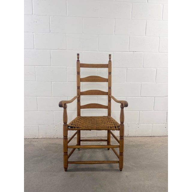 This early 19th-century primitive farmhouse ladder-back chair exemplifies the pinnacle of American Folk Art. Nearly 200...