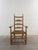 This early 19th-century primitive farmhouse ladder-back chair exemplifies the pinnacle of American Folk Art. Nearly 200...
