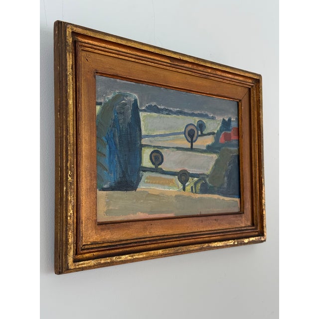This is a fabulous modernist landscape oil painting in its original gilt frame. The playful composition and color palette...
