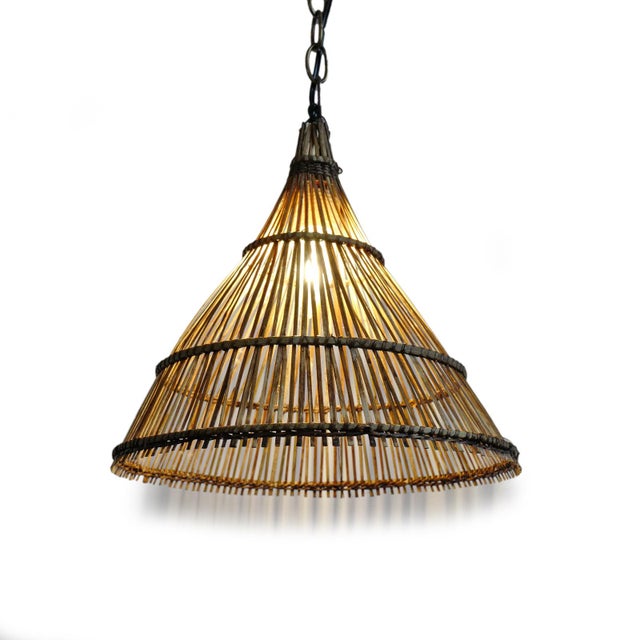 Charming tea stained wicker stick hat pendant lantern. Beautiful natural material with wide open bottom for direct...