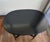 Black oval high occasional wooden table no. has lower shelf. age approximately 30 years. Table top width 30", depth 20",...