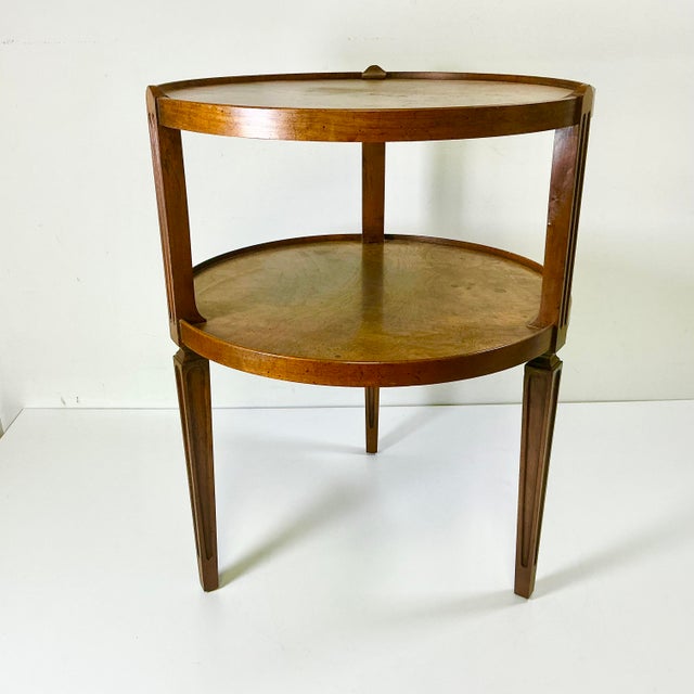 Vintage Home is pleased to offer this vintage Baker Furniture Drinks Table. It’s crafted from Burlwood and has a...