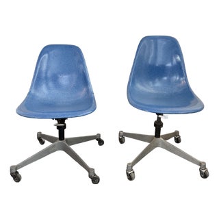 Pair of Eames for Herman Miller Blue Fiberglass Rolling Chairs For Sale