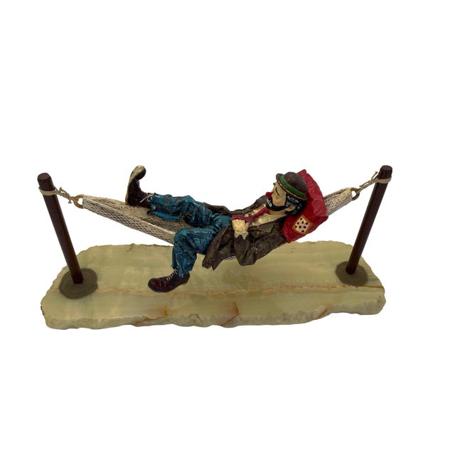 Created in 1988 by American sculptor Ron Lee (1947–2017), this signed figurative sculpture beautifully captures the quiet...