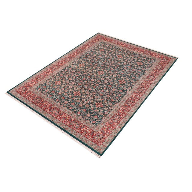 Designed with mesmerizing intricacy and gorgeous color palette, this hand-knotted masterpiece demonstrates the beauty and...