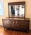 Stunning MCM Broyhill Brasilia triple dresser with matching mirror. This architectural designed pieces have attractive...