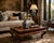 Richly detailed and visually striking, this vintage Baker Furniture coffee table features a luxurious oxblood-toned finish...