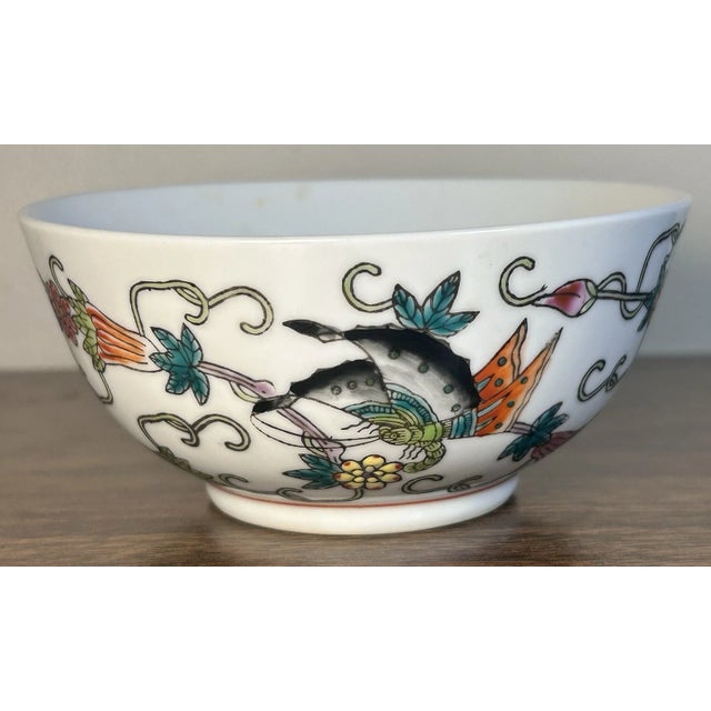 This is a Vintage 1980’s Chinese Export Porcelain Floral Vine/Butterfly Motifs Tea Bowl. It measures 2 1/8” tall and 4...