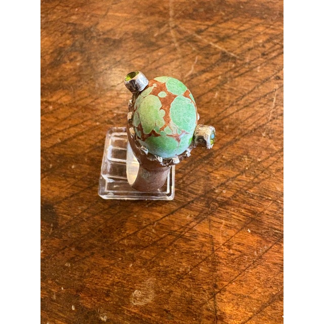 Contemporary Turquoise Ring in a Crown Shaped Sterling Silver Setting With Two Peridot Gemstones For Sale - Image 3 of 4