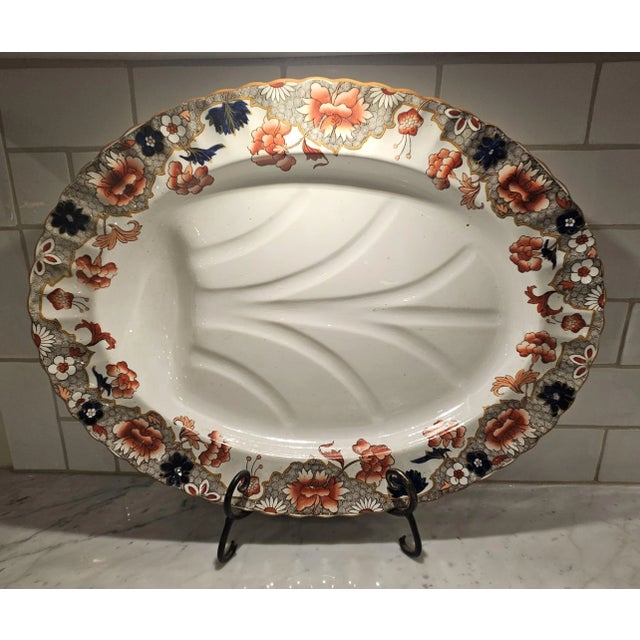 Late 1800's, Copeland "late Spode", footed meat carving platter. Unusually large size 21" x 16". With a gravy depression....