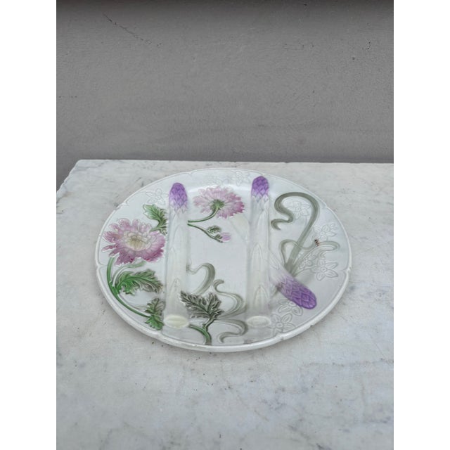 Majolica Art Nouveau asparagus plate with mums signed Keller et Guerin Saint Clement. 9 inches diameter. Every important...