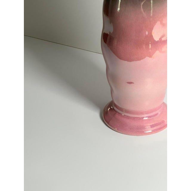 A pink lustre ware vase by maling pottery, produced in newcastle-upon-tyne, england, circa 1930s. Known primarily for...