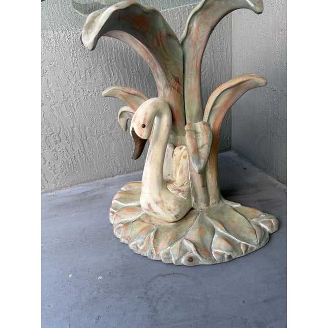 This is an incredible and unique hand painted and hand carved swan and palm leaf console. The shape is a demilune with a...