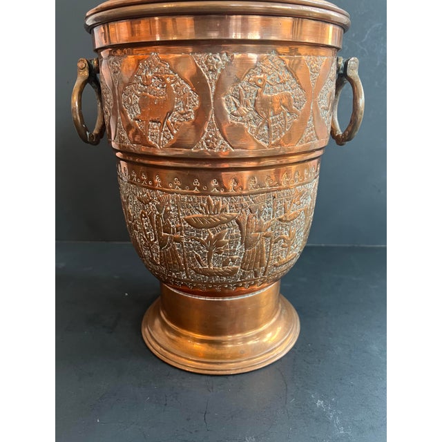 Great vintage copper ice bucket with lid which can also be used as a planter! Incredible design.