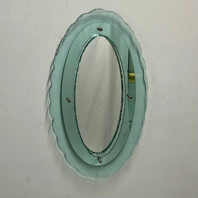 Italian Mid-Century Modern Fontana Arte Oval Glass Wall Mirror or Mirrored Plateau Tray A stunning rare and important wall...