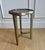 The Caracole Modern Edge “Contour” Side Table combines luxurious materials with an organic silhouette to create a...