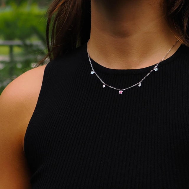 Add a touch of whimsy and sparkle with the Rainbow Butterfly Sterling Silver & Diamond Choker Necklace. This delicate...