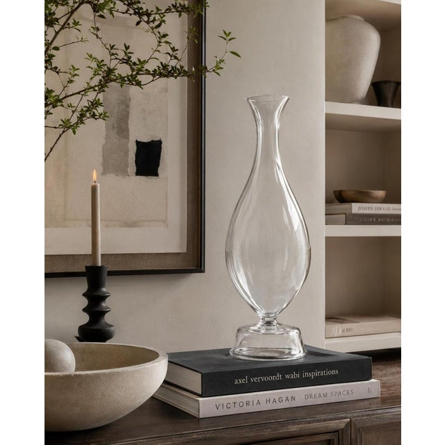 An exceptional and increasingly collectible signed PIMS blown glass bottle or sculptural vase designed by celebrated...