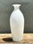 This elegant Mid-Century Modern vessel is a masterclass in minimalist design, featuring a graceful, elongated silhouette...