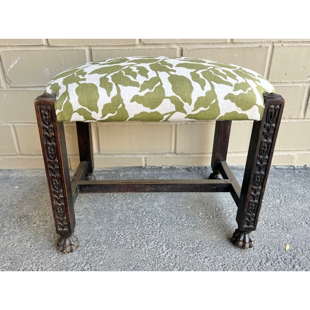 Italian carved wood stool/ ottoman, 20th c., rectangular seat in Walter G. fabric Flores in Moss on an Oatmeal ground...