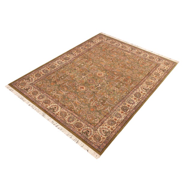 Designed with mesmerizing intricacy and gorgeous color palette, this hand-knotted masterpiece demonstrates the beauty and...