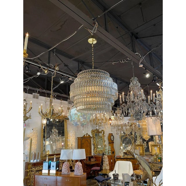 Very elegant modern Murano glass and brass multi-tiered drum form chandelier. Beautiful scale and shape and glistening...