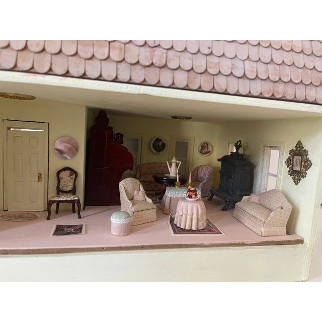 Vintage 1960 Two stories miniature yellow dollhouse cottage with mesonine. Fully furnished and decorated. Handmade by...