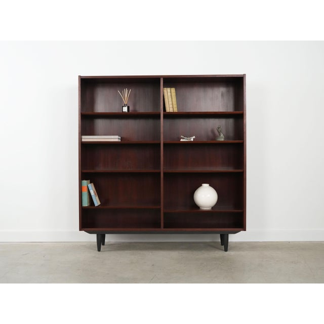 The bookcase was made in the 1970s by the renowned Danish manufacturer Hundevad, based on a design by Danish designer...